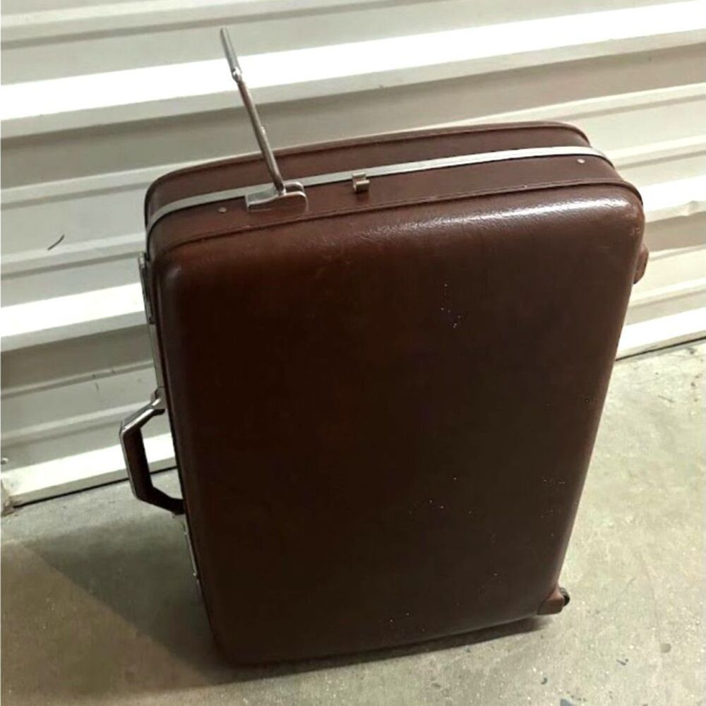 American Tourister Vintage Brown Vinyl Rolling Suitcase Beige Satin Interior